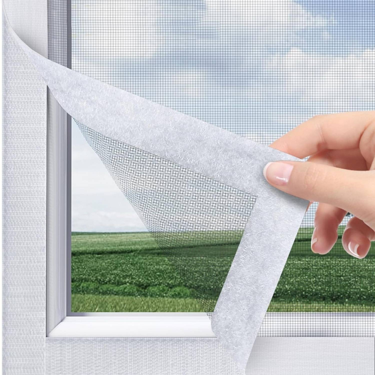 Custom velcro window screen with hook-and-loop adhesive edging being peeled back